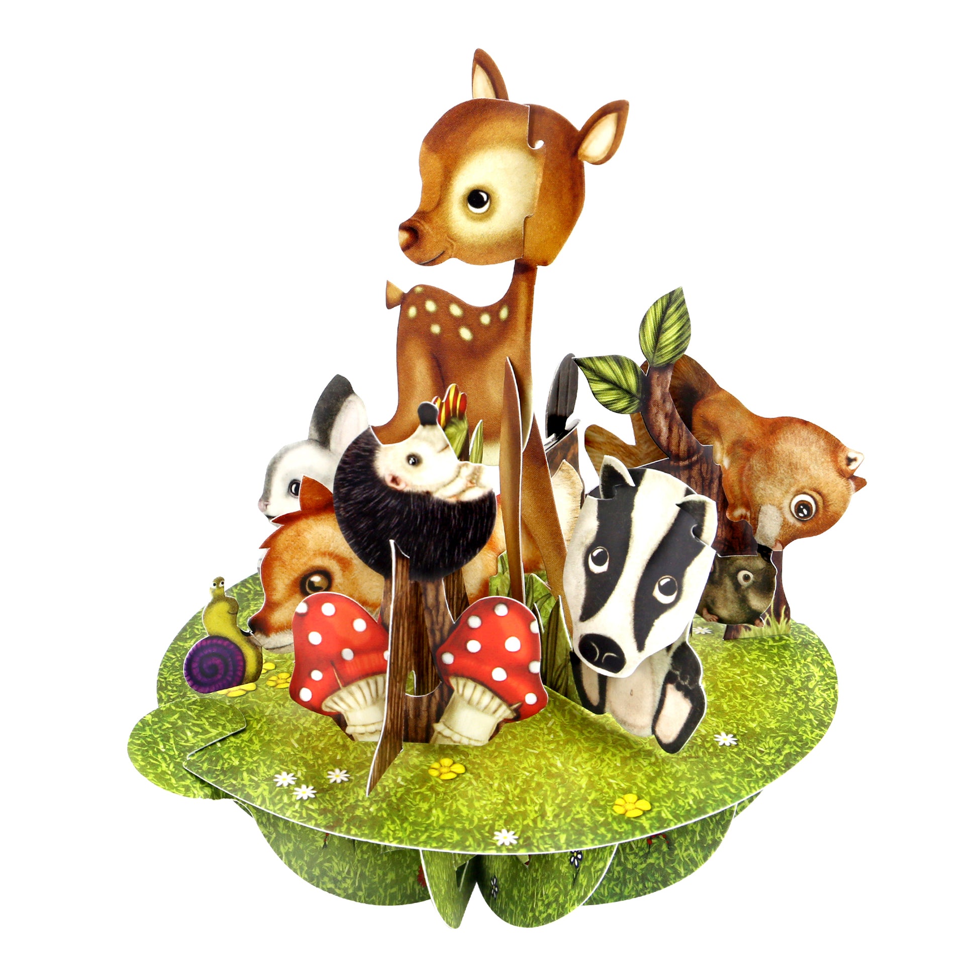 The Santoro Pirouette Card: Cute Baby Animals showcases adorable deer, badger, fox, hedgehog, squirrel, and snail on a circular grassy platform with mushrooms, greenery, and daisies in a vibrant pop-up display.