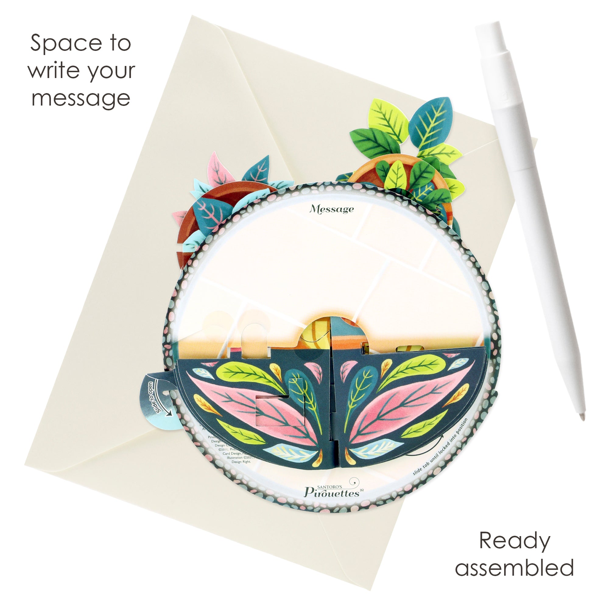 A Santoro Pirouette Card: Potted Plants, featuring a circular pop-up plant design, sits on an envelope beside a white pen. Text reads, "Space to write your message" and "Ready assembled.