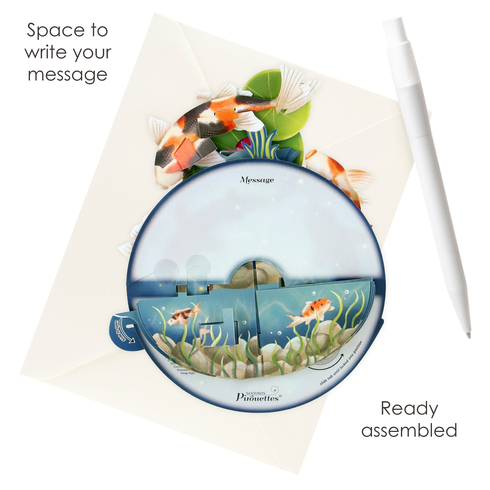 The Santoro Pirouette Card: Koi Carp is a round pop-up greeting card featuring koi fish and aquatic plants, shown on an envelope next to a pen, with “Space to write your message” and “Ready assembled” on the image.