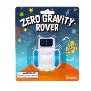 The Toysmith Zero Gravity Rover features a white rover with blue panels and magnetic power. Its space-themed package shows planets, stars, a small parts warning, and the Toysmith logo.