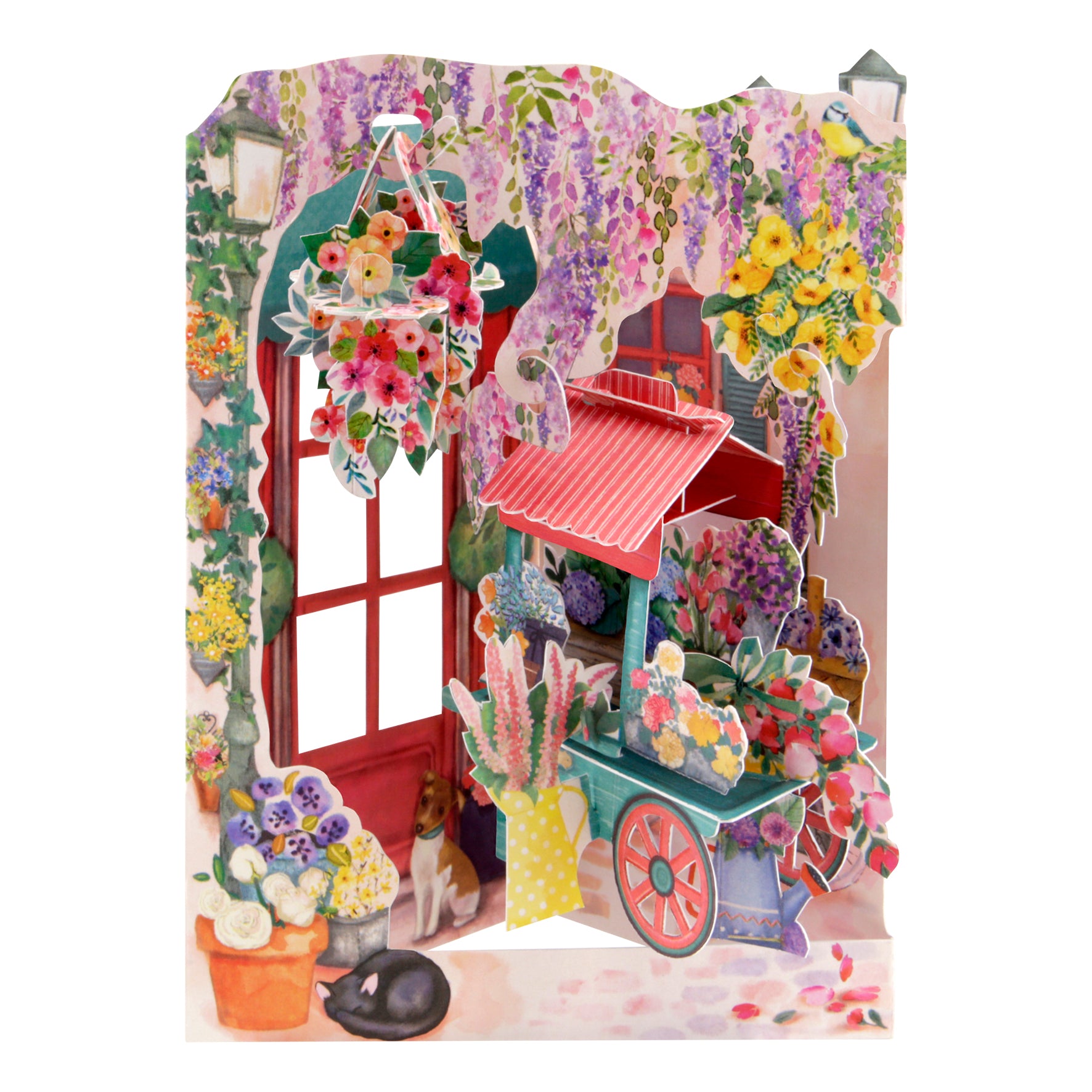 The Santoro Swing Card: Florist and Flowercart features a colorful flower shop with a red door, potted plants, hanging wisteria, a flower cart, a black cat sleeping on the ground, and a small dog by the entrance.