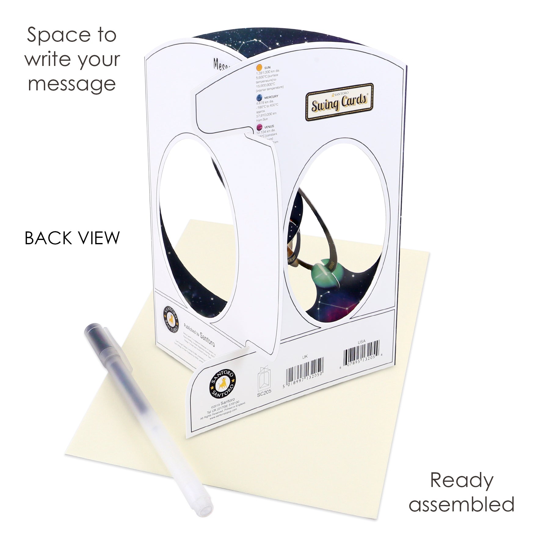 A back view of the Santoro Swing Card: Solar System with space for a message, shown alongside its envelope and a pen. The assembled card features circular cut-outs, a barcode, and labeled text highlighting each detail.