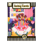The Santoro Swing Card: Birthday Celebrations is a colorful 3D pop-up card with a cake topped with seven candles, gifts, balloons, and a "Happy Birthday" banner.