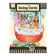 The cover of the Santoro Swing Card: Doggy Bath Time features a 3D pop-up illustration of a dog and cat in sunglasses and hats, sitting in a red claw-foot bathtub filled with bubbles.
