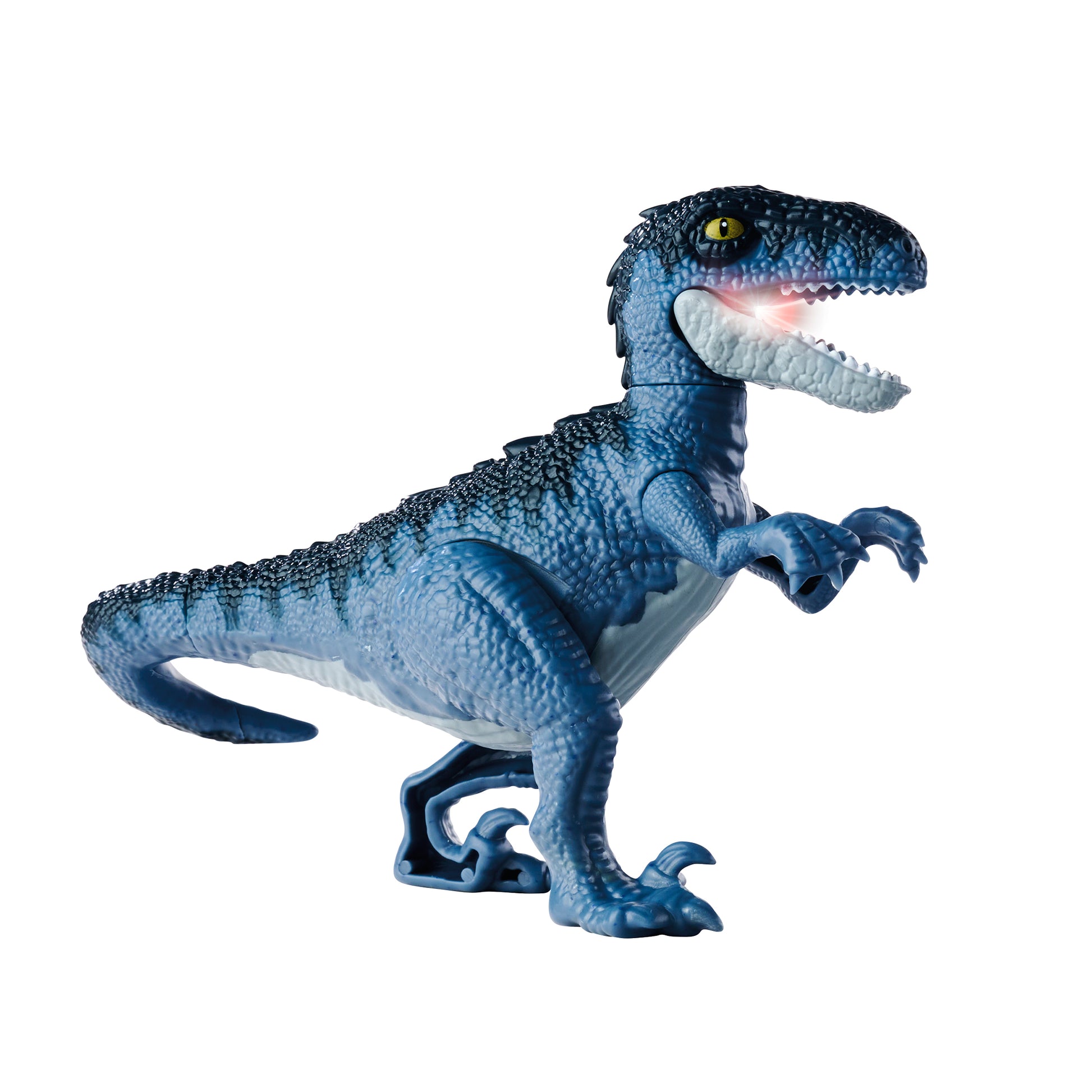 The Simba Dickie Light & Sound Dino Egg Asst features a blue dinosaur toy with yellow eyes, short raised arms, an open mouth with teeth, and a glowing red light and sound effects. The toy is displayed against a white background.