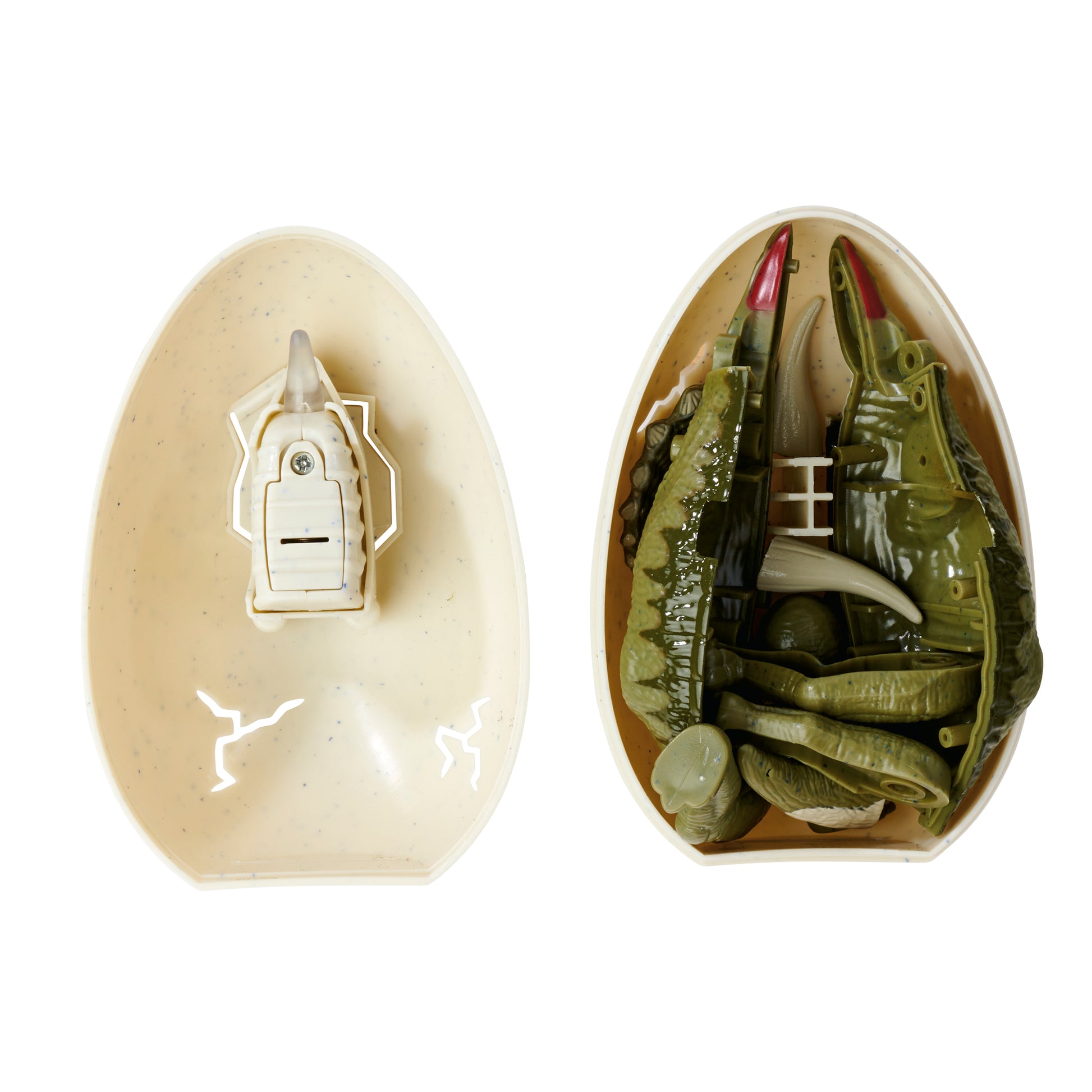 The Simba Dickie Light & Sound Dino Egg Asst features a plastic egg—one half with a light and sound mechanism, the other containing unassembled green and white dinosaur toy parts, ready for fun dino hatching.