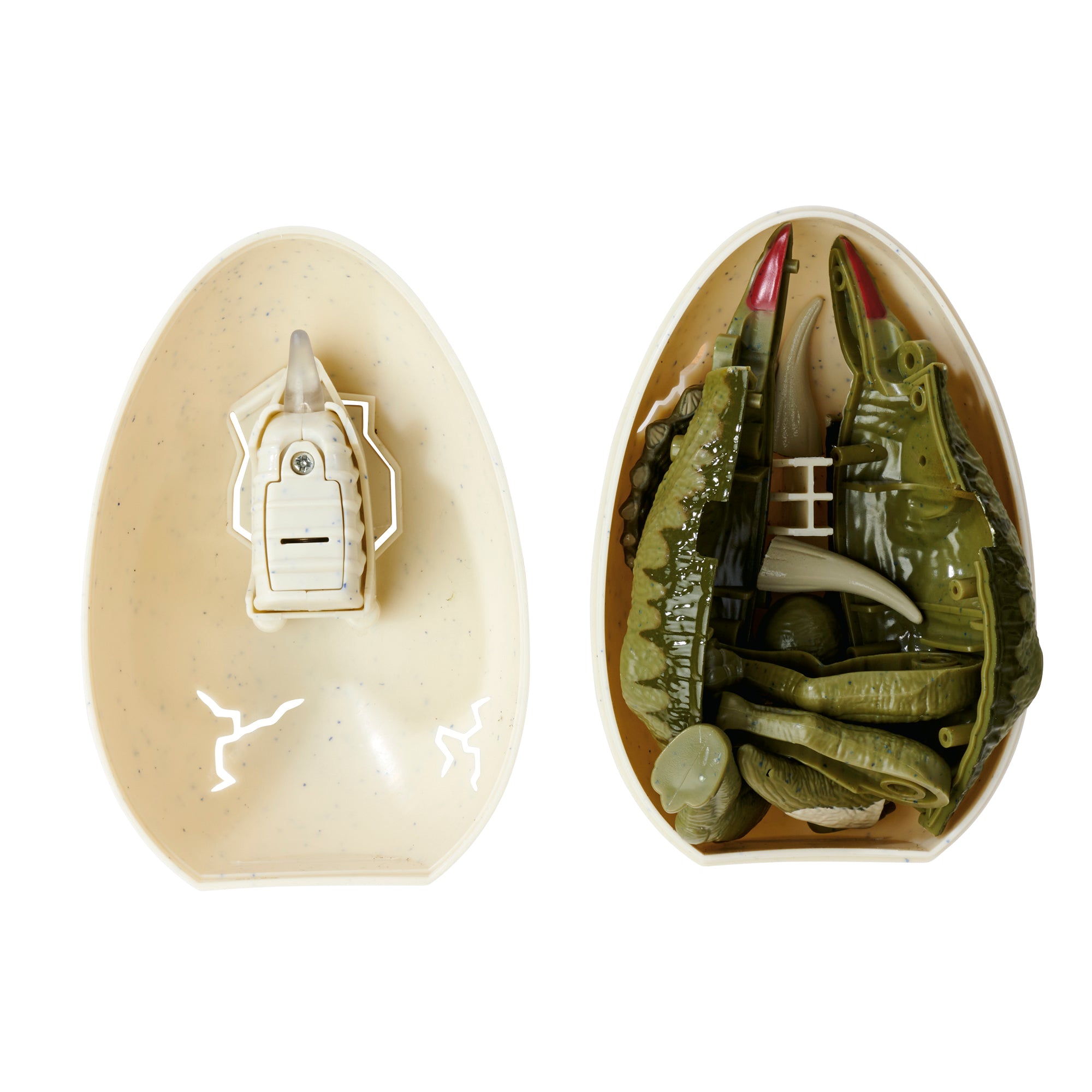 The Simba Dickie Light & Sound Dino Egg Asst features a plastic egg—one half with a light and sound mechanism, the other containing unassembled green and white dinosaur toy parts, ready for fun dino hatching.