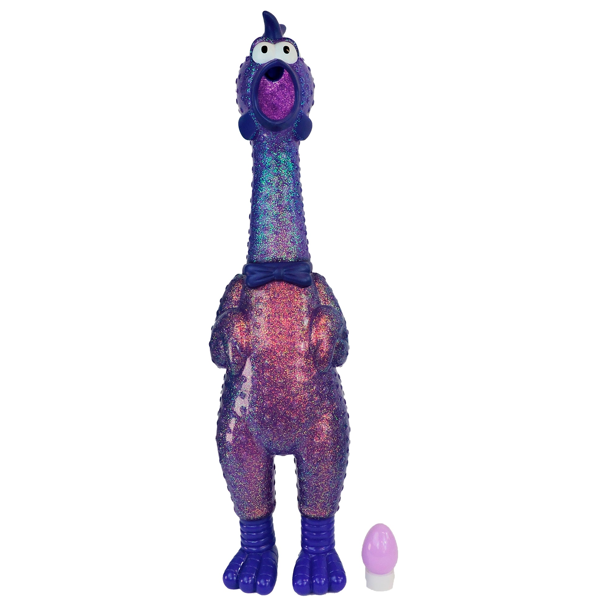 The Say Whaaaaat?! Ampli-Flyer is a glittery purple dinosaur toy with an elongated neck, bulging eyes, and a bowtie, standing upright beside a small purple-and-white egg for playful fun.