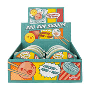 Toysmith Bao Bun Buddies by Toysmith come in a display box with cheerful cartoon bao buns—chicken, pork, and beef varieties—featured on colorful graphics. These playful animal squishies are perfect stress-relief fidget toys.