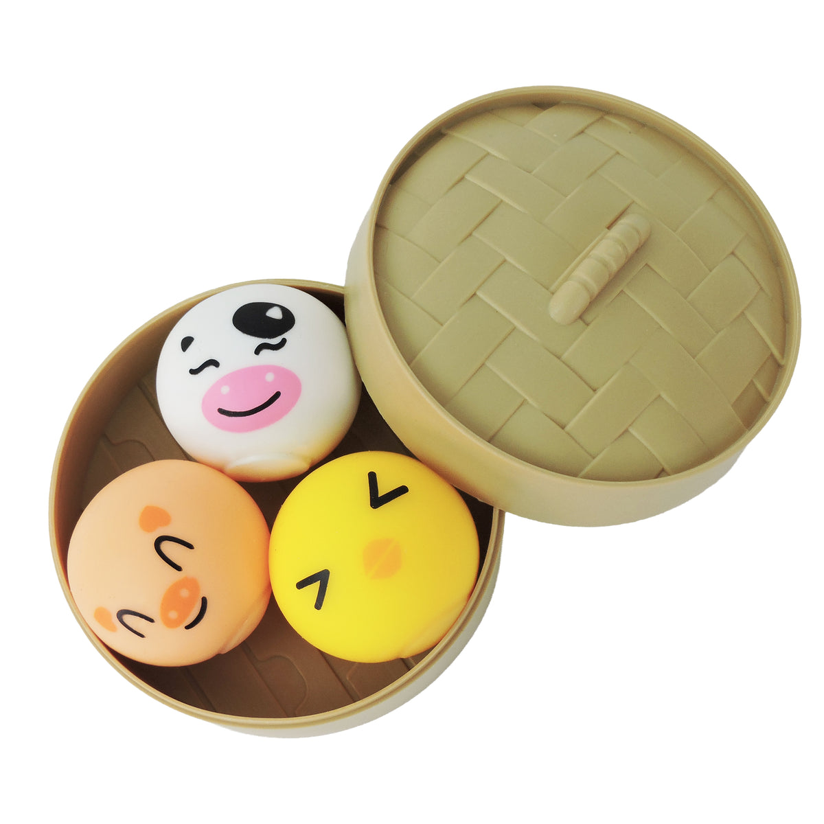 The Toysmith Bao Bun Buddies by Toysmith come in a round, tan container with a woven pattern lid and include three cute animal squishies—white, peach, and yellow—each with a cartoon face, perfect as fidget toys.