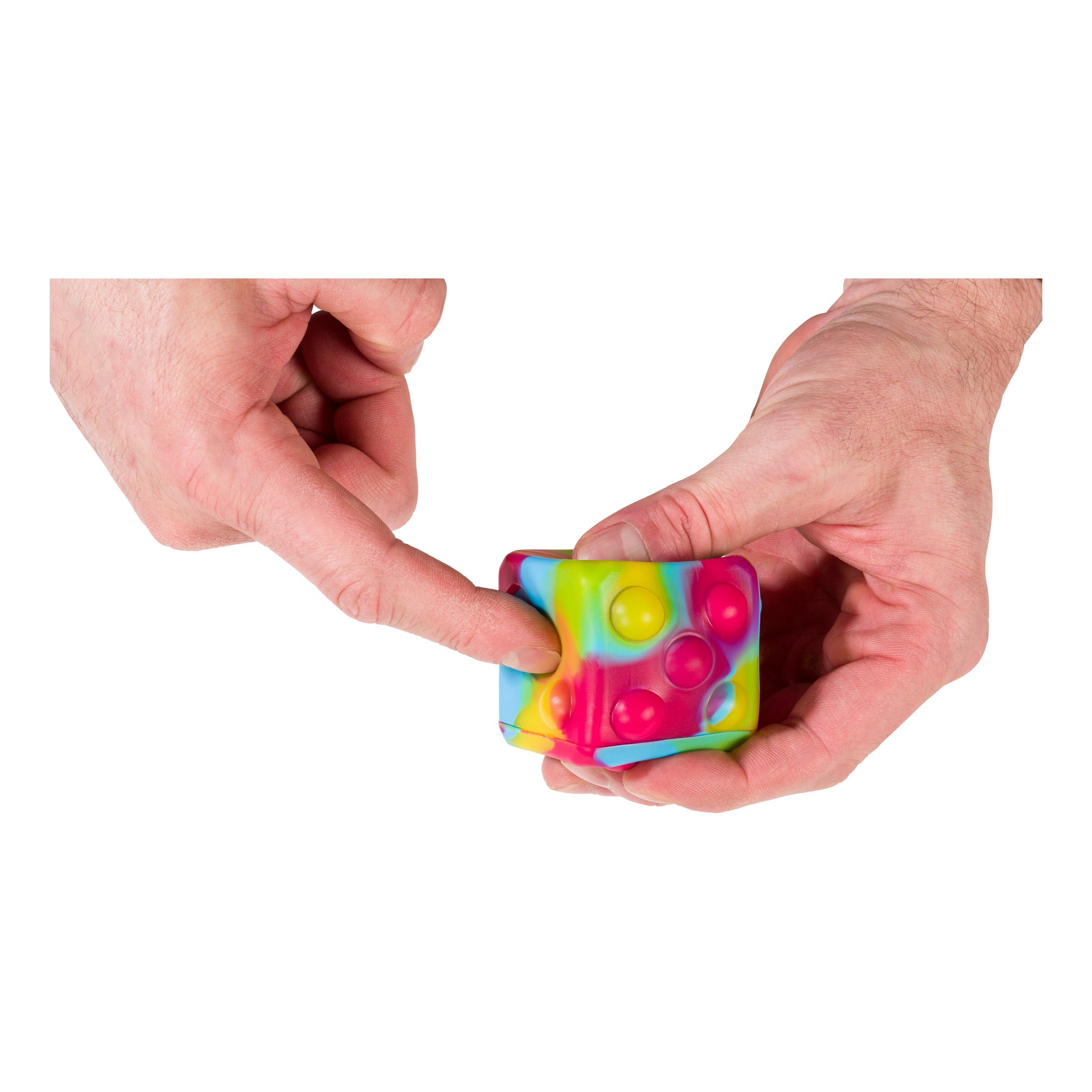 Someone presses both hands into the Toysmith Poppin' Dice - Rainbow, a squishy sensory cube from Toysmith with raised bubbles in vibrant yellow, blue, pink, and green.