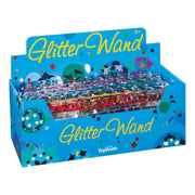 A vibrant blue display box labeled Toysmith Spiral Glitter Wand showcases colorful spiral glitter wands. Featuring a confetti design and Toysmith logo, this fun sensory toy is suitable for ages 5 and up.