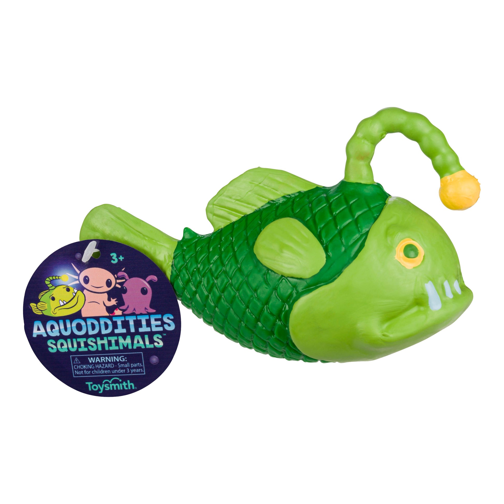 The Toysmith Aquoddities Squishimals is a green anglerfish-shaped squishy toy with a yellow lure, shown with its round Aquoddities tag featuring cartoon sea creatures.