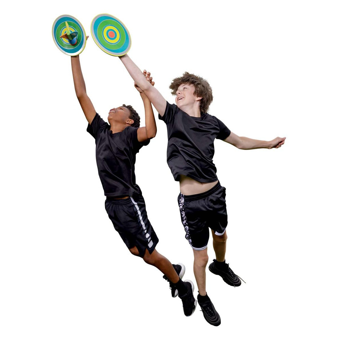 Two boys in black athletic outfits jump and compete with round, colorful paddles from the GO! Play Triple Play Combo Set by GO! Play. They’re playing an active kids’ game together against a plain white background.