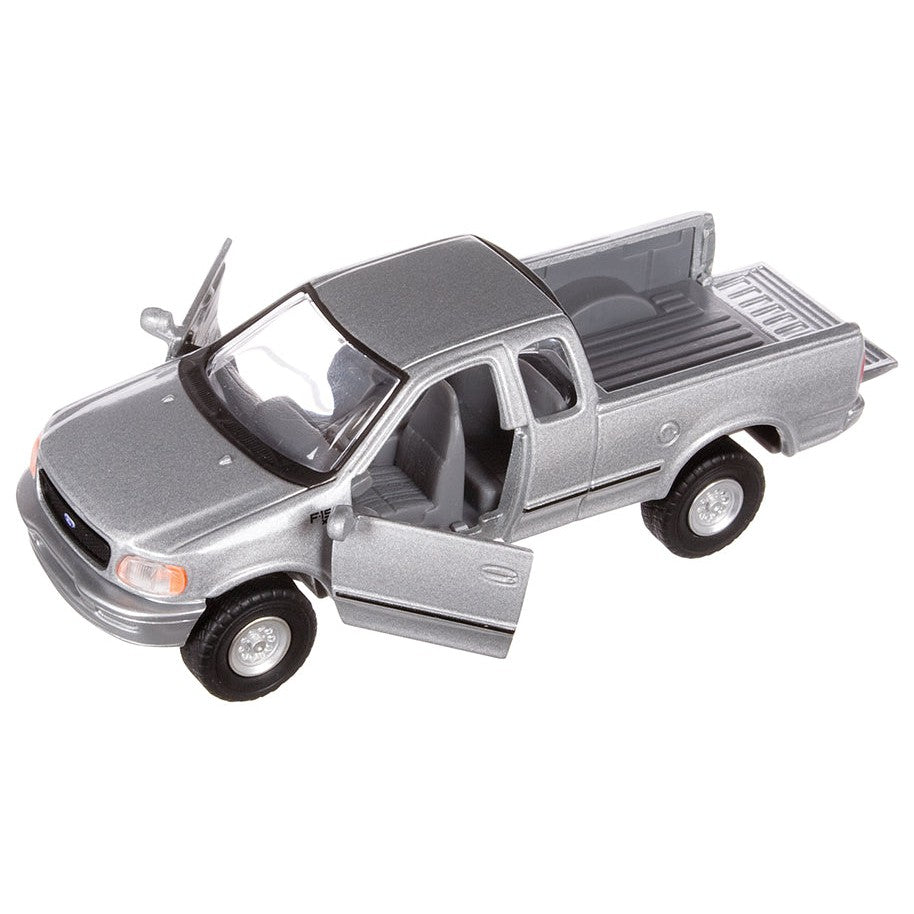 A silver Toysmith Ford F-150 Truck toy with both front doors open, seen from above and at an angle. The detailed interior is visible and the cargo bed is empty.