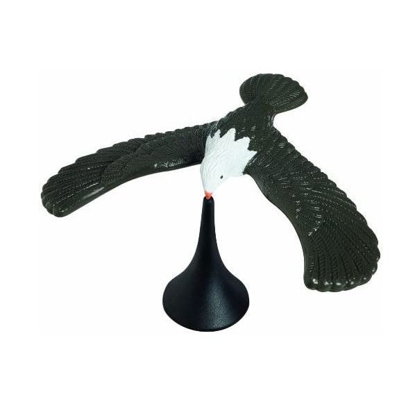 The Toysmith Balancing Eagle by Toysmith is a plastic figurine with outstretched wings that balances on its beak atop a black cone stand—a unique novelty toy in flight.