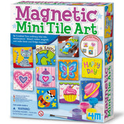 The 4M-Craft Magnetic Mini Tile Art set comes in a colorful box featuring painted tile designs such as a cat, cupcake, and butterfly. This craft kit for ages 8+ includes supplies to create your own magnetic fridge art.