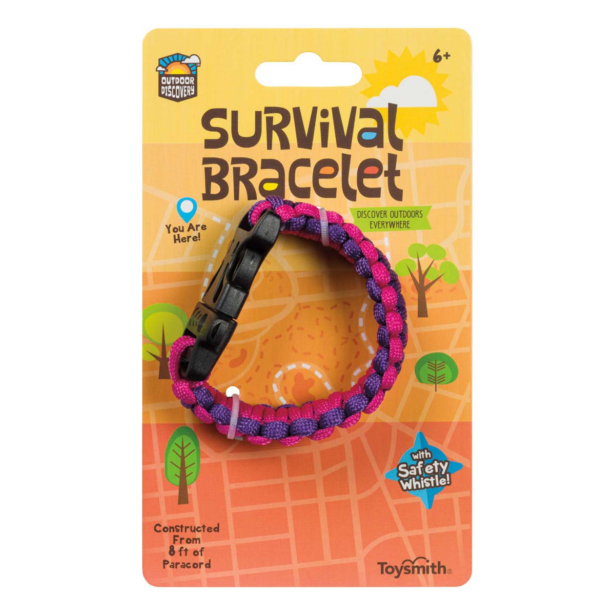 The Outdoor Discovery Survival Bracelet by Outdoor Discovery is a packaged purple and pink paracord bracelet with a black clasp, labeled for ages 6+, featuring a built-in safety whistle and durable paracord construction.
