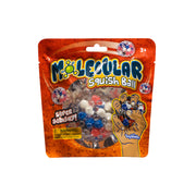 An orange package labeled Toysmith Molecular Squish Ball reveals a clear sensory toy packed with colorful beads, playful cartoon designs, and a warning stating it’s for children ages 3 and up. A hand squeezing the ball shows its stress-relief function.
