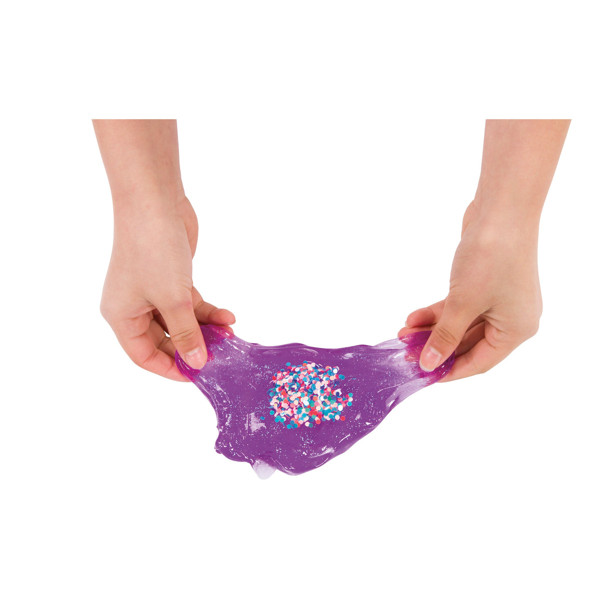 Two hands stretch Toysmith Mix-Ins Slime Asst by Toysmith, showing its purple color and colorful mix-ins at the center, against a white background.