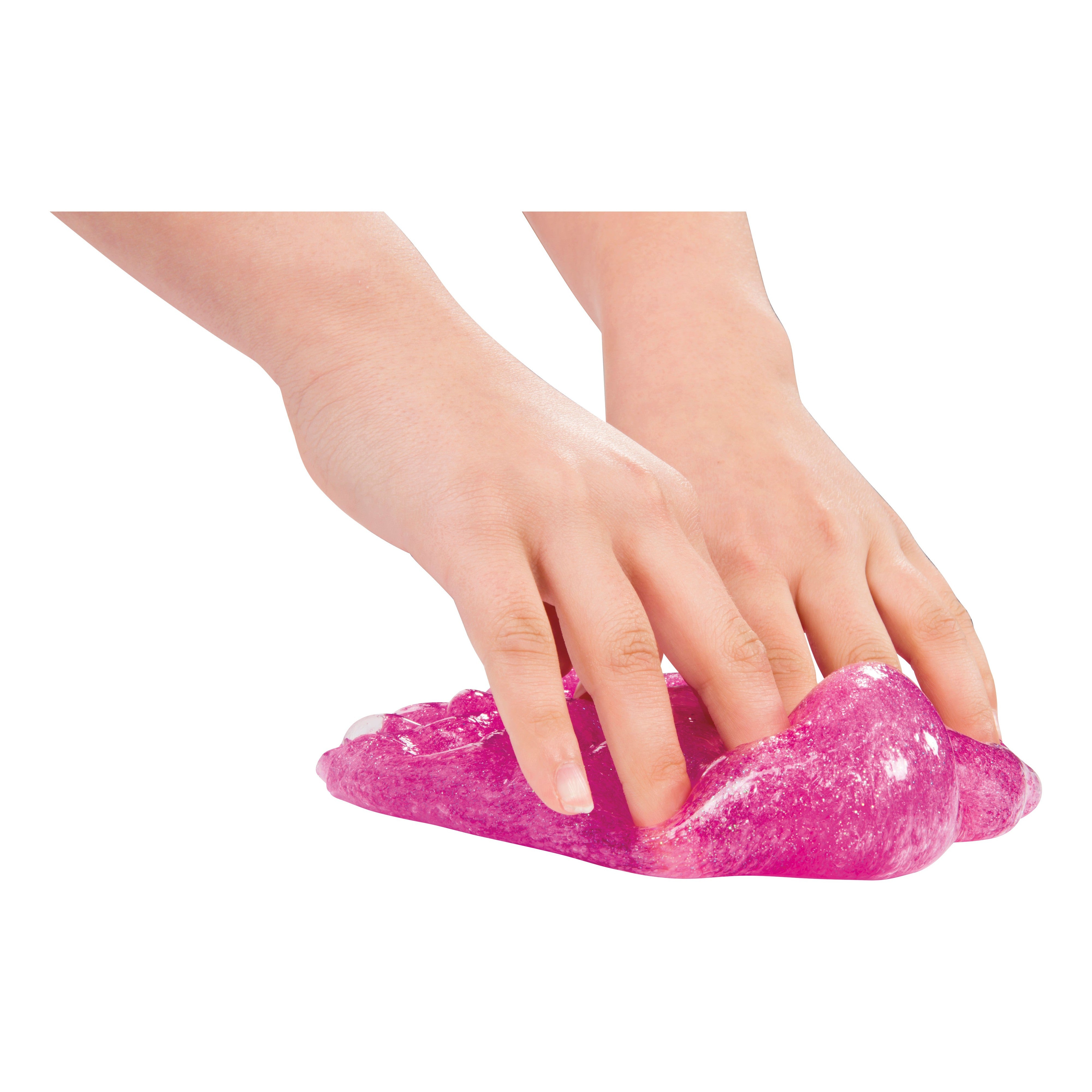 Two hands stretch and fidget with Toysmith Glitter Slime by Toysmith, showcasing its shiny pink sparkle for a captivating sensory play experience against a white background.