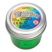 A small jar of Toysmith Glitter Slime by Toysmith features a silver lid, colorful label with glittery text, safety warnings, recycling info, and bright green sparkly slime inside—great for fidgeting or sensory play.