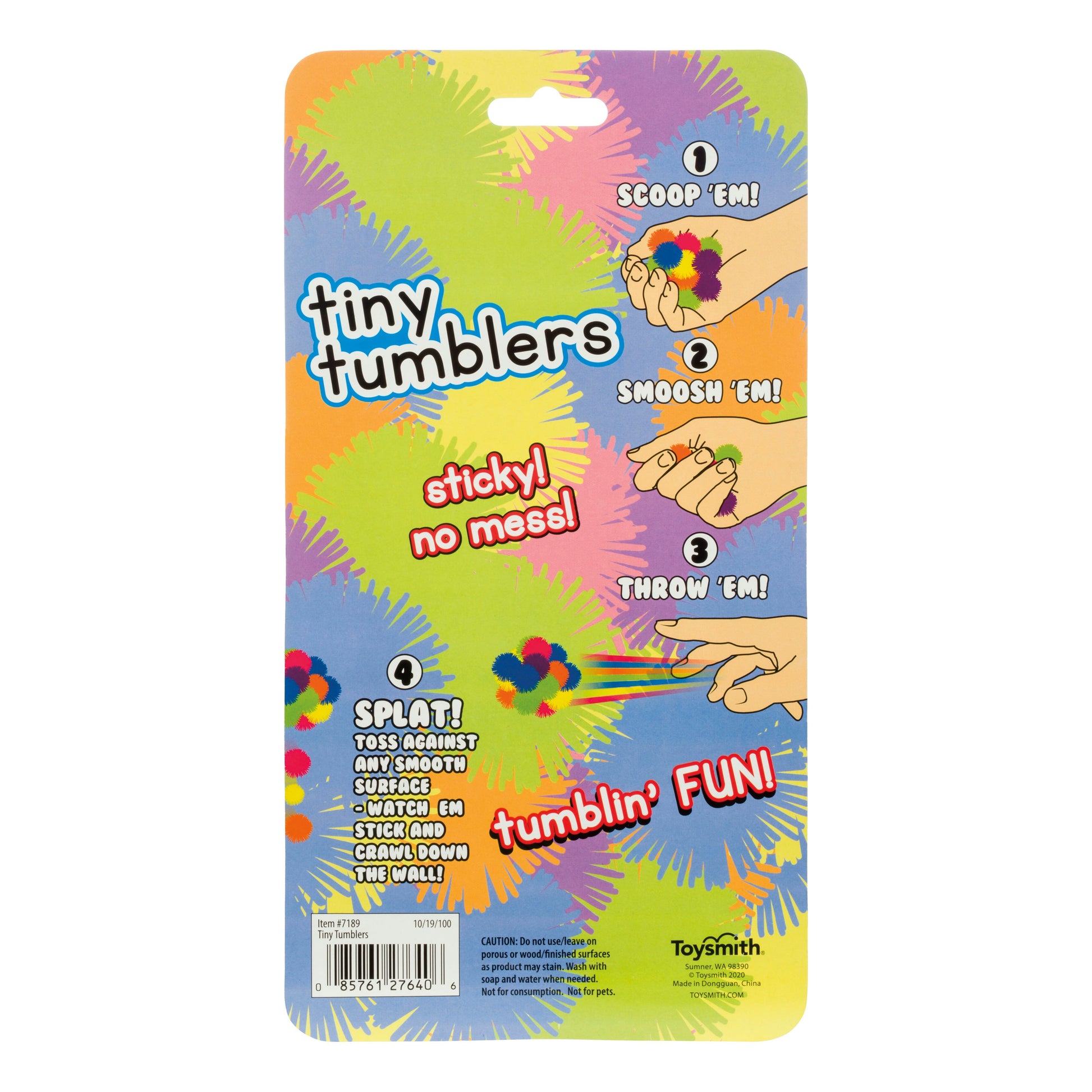 Tiny Tumblers by Toysmith features colorful packaging with illustrated instructions: scoop, smoosh, and throw the sticky toy that splats on walls. Highlights include “sticky! no mess!” and “tumblin FUN!” for sensory play.