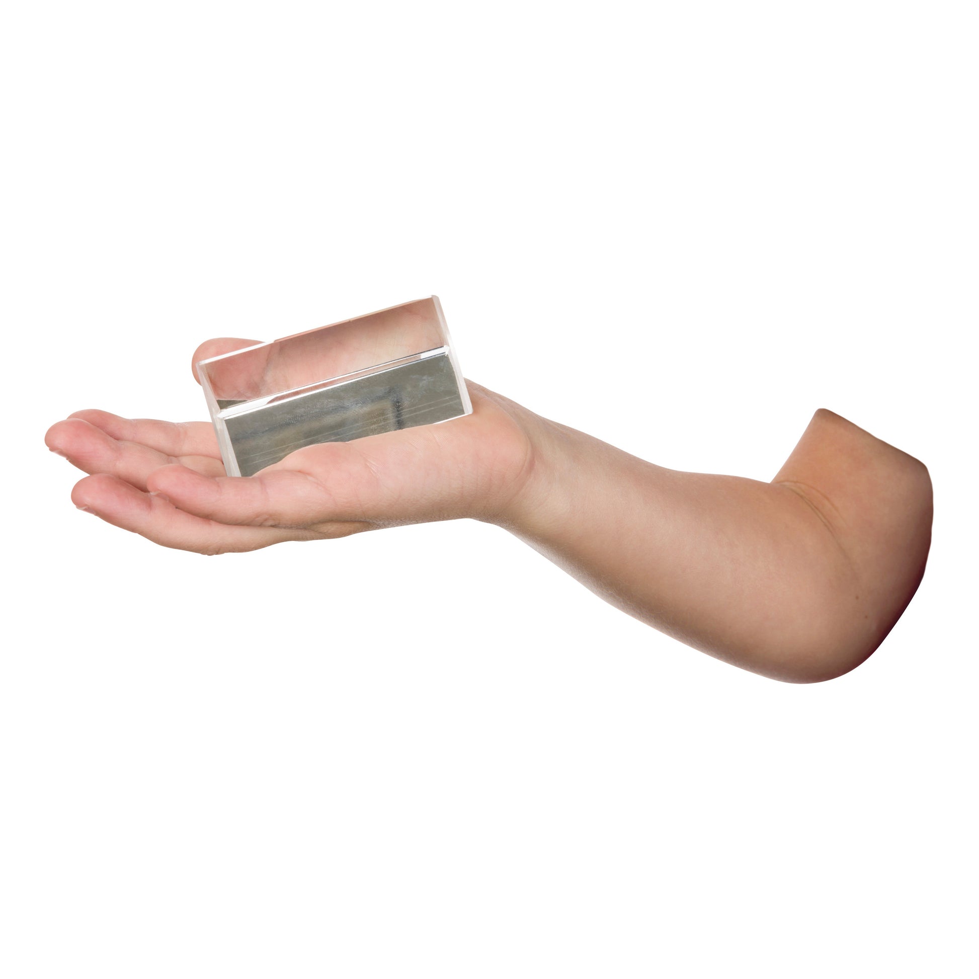 A hand holds the Toy Science Right Angle Prism—a clear glass or acrylic block for optics and STEM by Toy Science. The image shows the prism in an extended palm, isolated on a white background.