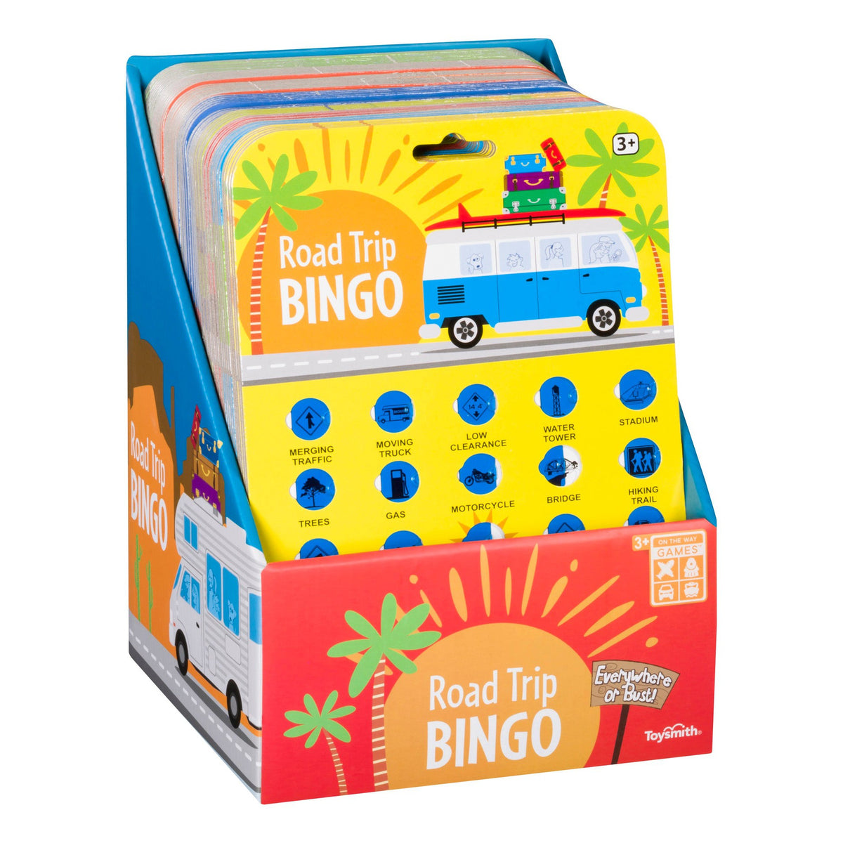 A blue and yellow display box holds several On the Way Games Road Trip Bingo boards with a blue van, luggage, and travel icons. This fun game from On the Way Games is for ages 3+ and perfect for road trips.