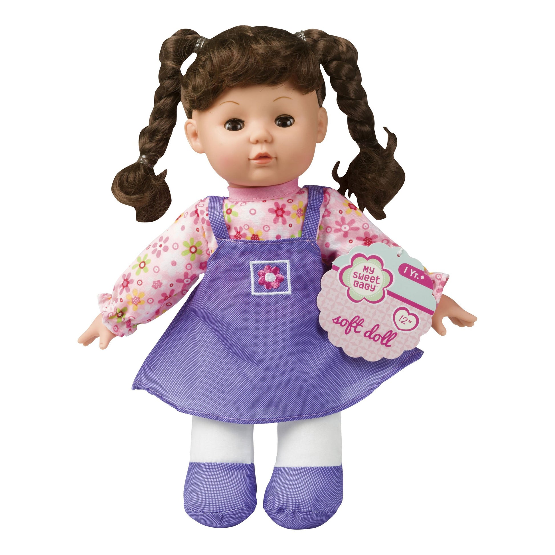 The My Sweet Baby 12in Soft Doll by My Sweet Baby wears a floral long-sleeve top, purple dress, matching shoes, and features brown pigtails—ideal for cuddle time and pretend play.